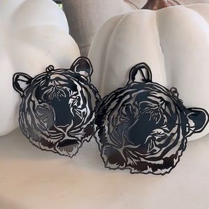 Black metal tiger earrings